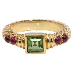 Anello David Yurman anni '90 in oro giallo 18 carati con peridoto e rubino