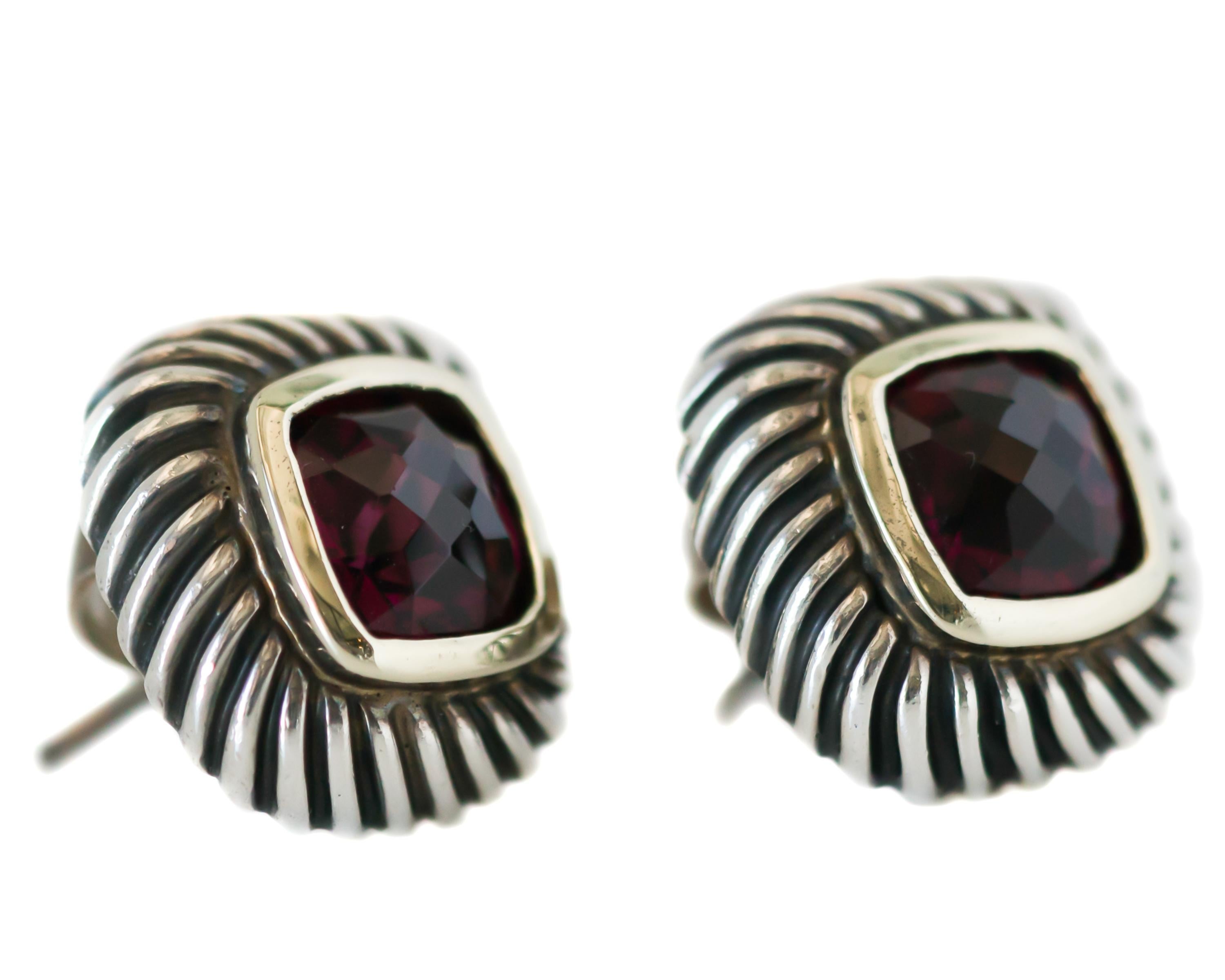 1990s David Yurman Cable Stud Earrings - 14 Karat Yellow Gold, Sterling Silver, Garnet

Features:
Cushion cut faceted Garnet center stone
14 Karat Yellow Gold Bezel setting and Post
Sterling Silver Cable Frame and earring back
Earrings measure 14