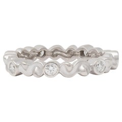 1990's Diamond 14 Karat White Gold Vintage Scrolling Bezel Band Ring