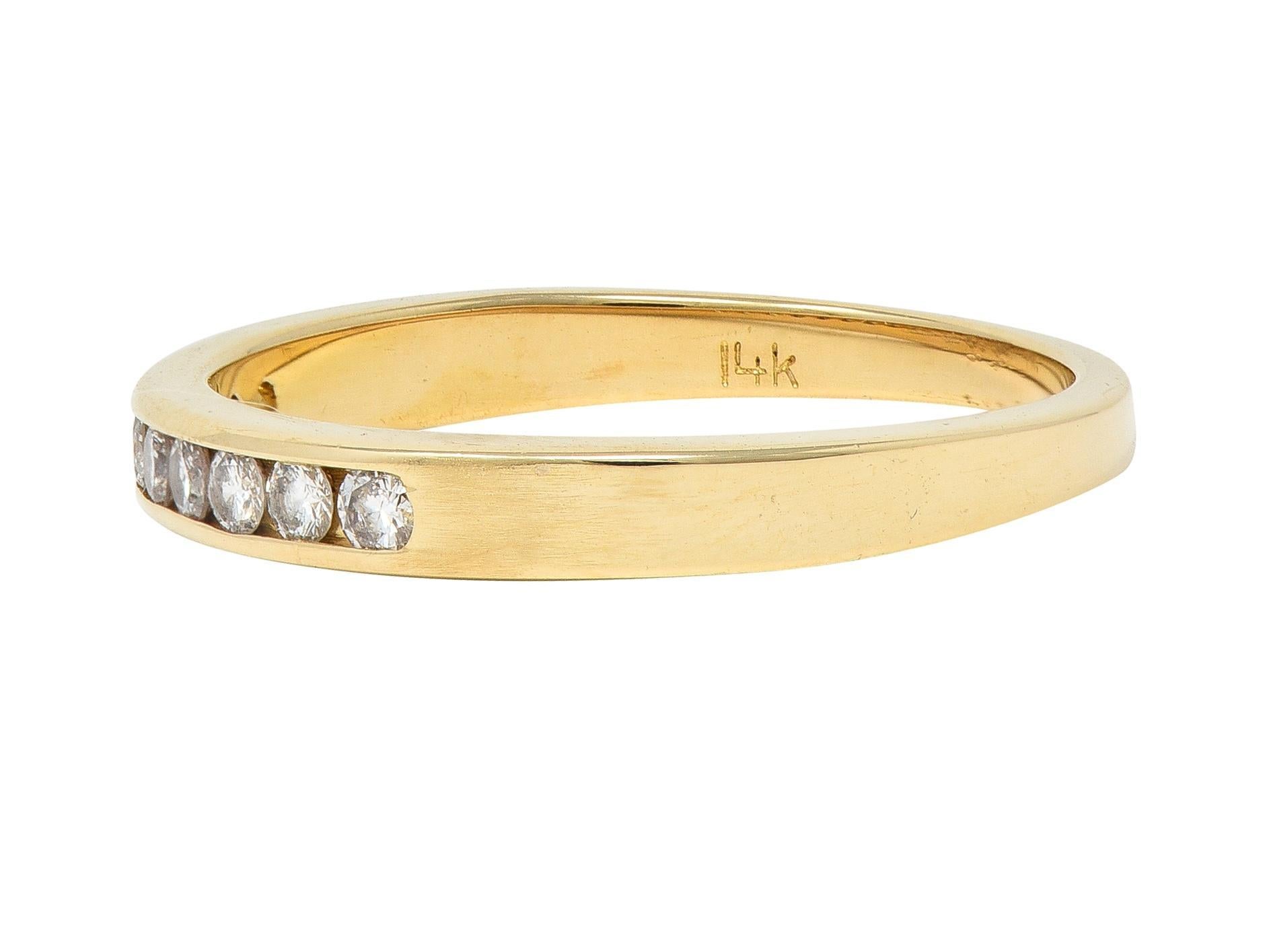Women's or Men's 1990's Diamond 14 Karat Yellow Gold Vintage Channel Band Ring For Sale