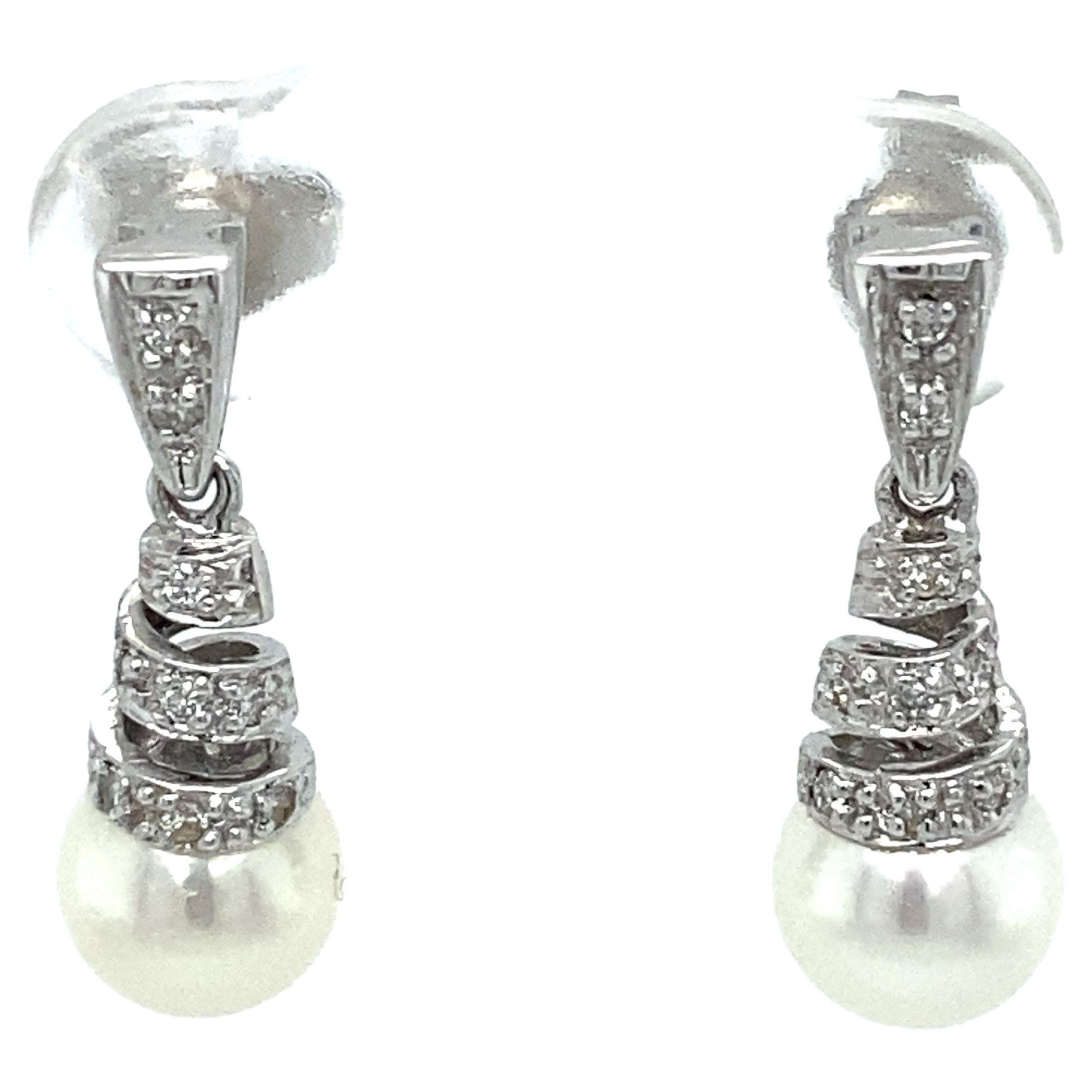 1990s Diamond and Pearl Spiral Drop Earrings in 14 Karat White Gold