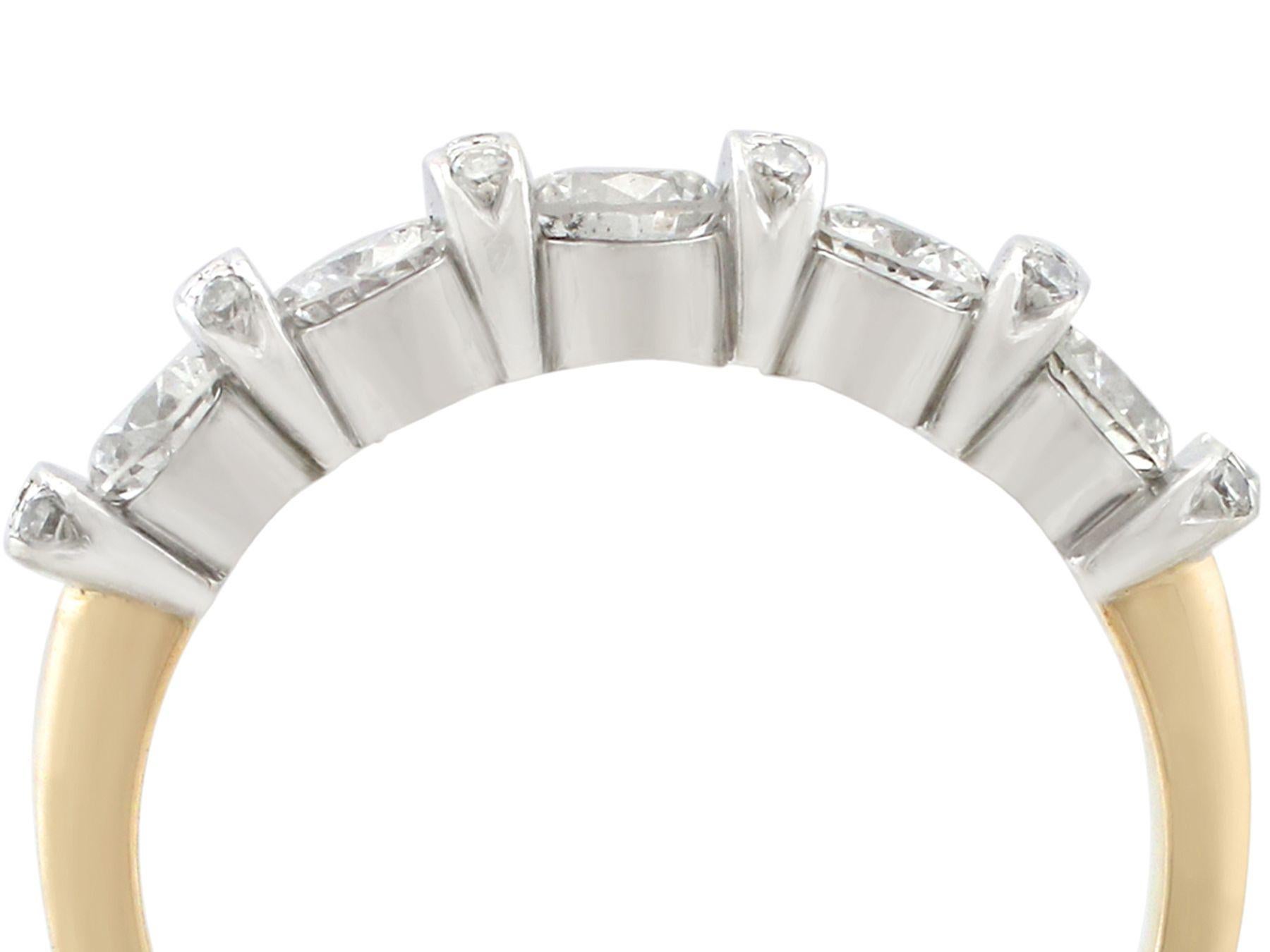 An impressive vintage 0.80 carat diamond and 14 karat yellow gold, 14 karat white gold set half eternity ring; part of our diverse antique jewelry collections.

This fine and impressive diamond half eternity ring has been crafted in 14k yellow gold