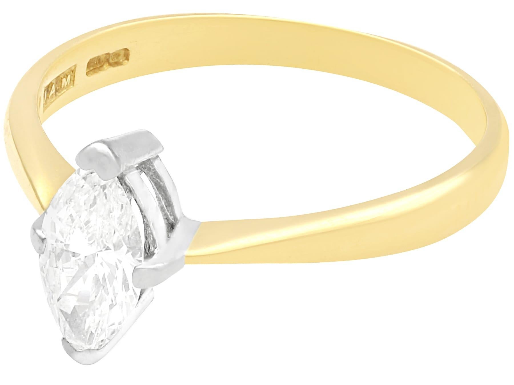 A fine and impressive vintage 0.56 carat diamond and 18 karat yellow gold, 18 karat white gold set solitaire ring; part of our diamond jewelry and estate jewelry collections.

This impressive marquise solitaire ring has been crafted in 18k yellow