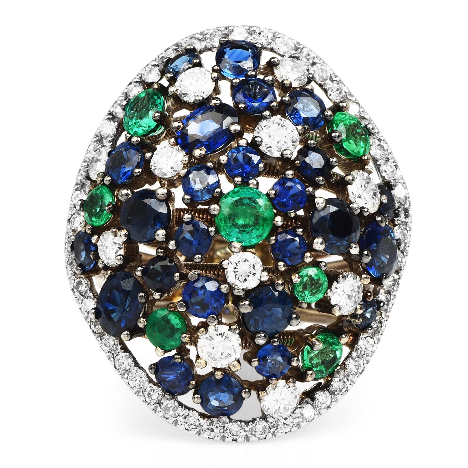 Be exciting and bold with this vivid Estate Diamond Colombian Emerald, Sapphire  18k gold Cluster Ring!  This bright large cocktail ring showcases approximately seven genuine Vibrant green Round Colombian Emeralds of 2.10 carats and 27 round and