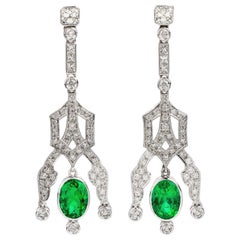 1990s Diamond Emerald 18 Karat Gold 6.22 Carat Oval Drop Dangle Earrings