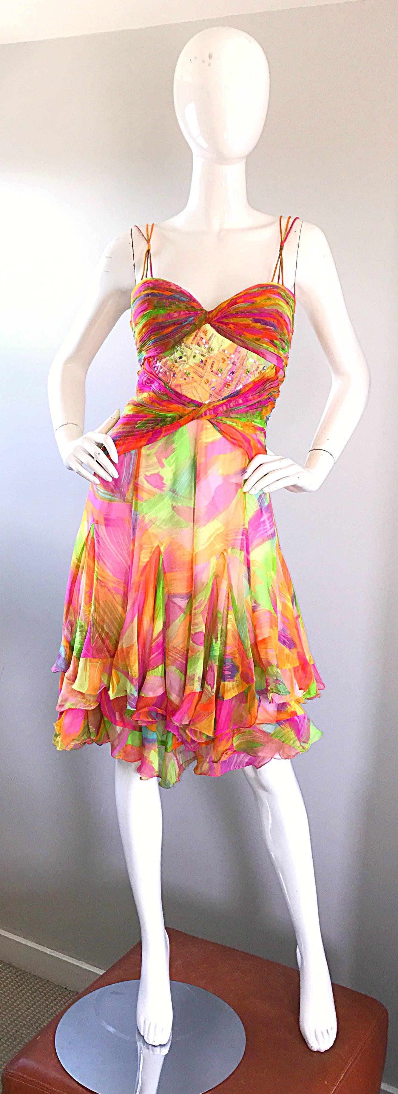 Insanely beautiful vintage (brand new with tags) 1990s DIANE FREIS bright neon silk chiffon dress! Features vibrant colors of pink, green, blue, orange and fuchsia throughout. Flattering ruched detail at stomach and bust. Triple strand straps at