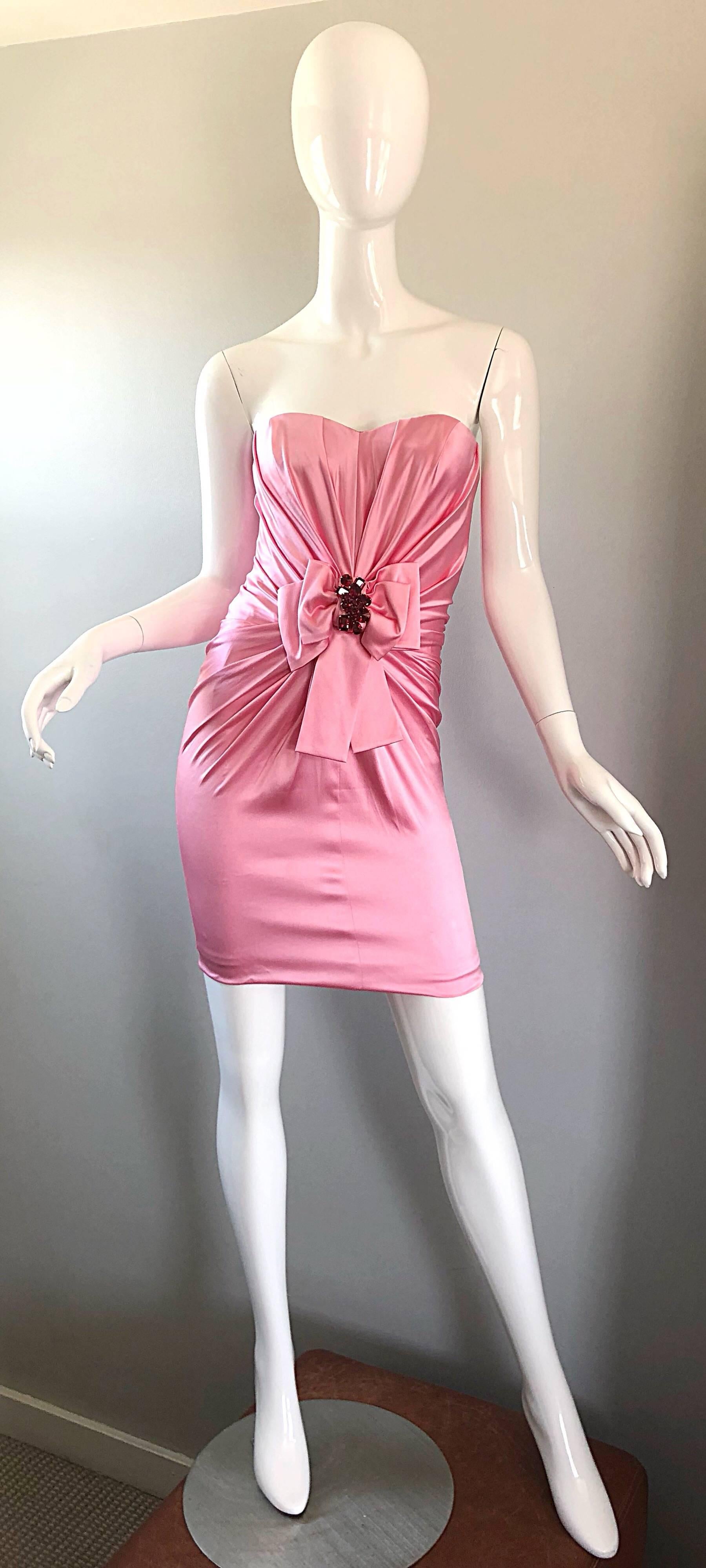 Sexy vintage late 90s DOLCE & GABBANA bubblegum pink silk strapless mini dress! Features flattering drapes and gathers on the front, with bow detail at center waist. The bow is encrusted with hand-sewn red rhinestone beads. Full metal zipper up the