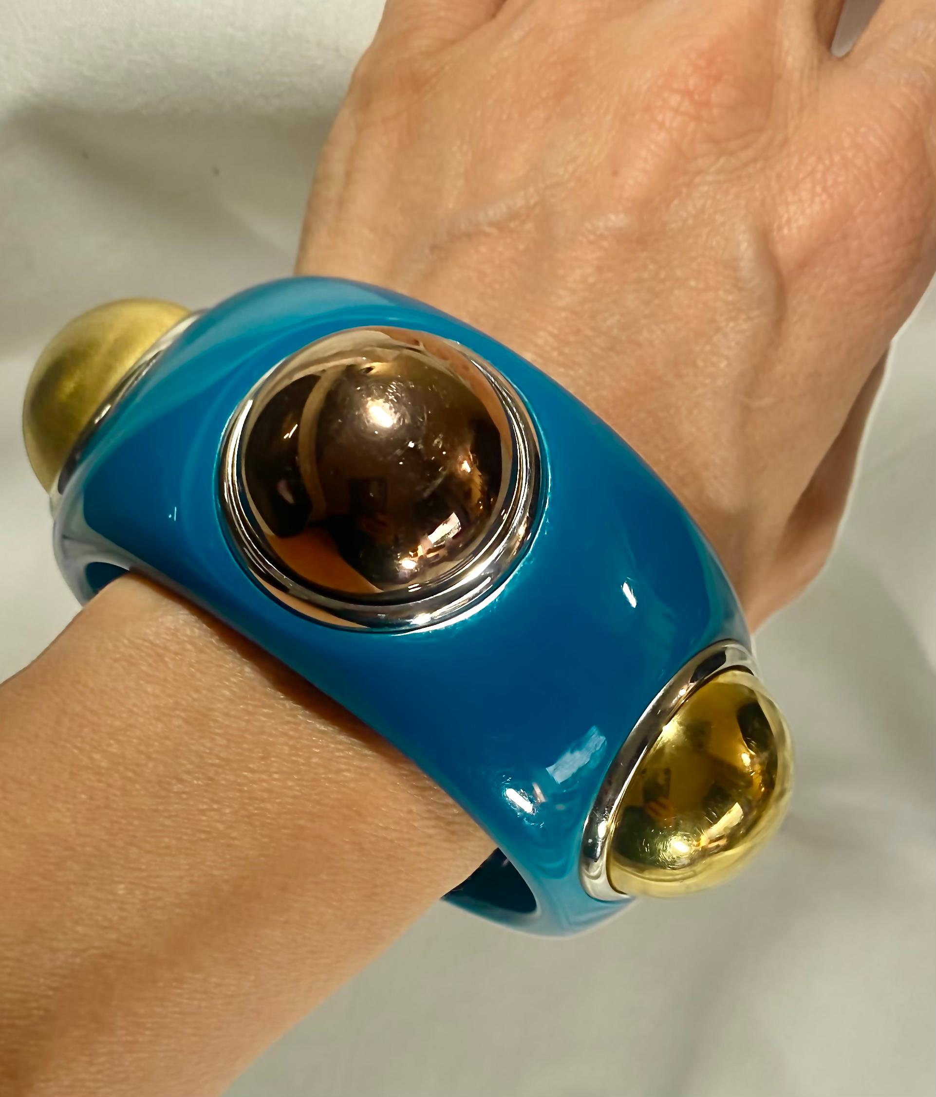 Dolce & Gabbana D&G Emerald Blue Cuff Bangle, thick resin, gold and bronze half pearls, 

Measurements
Weight: 180gr 
Inside diameter: 7.5cm
Height: 3.5cm

Condition: 1990s, overall good, just a small mark/scratch as shown in last image
