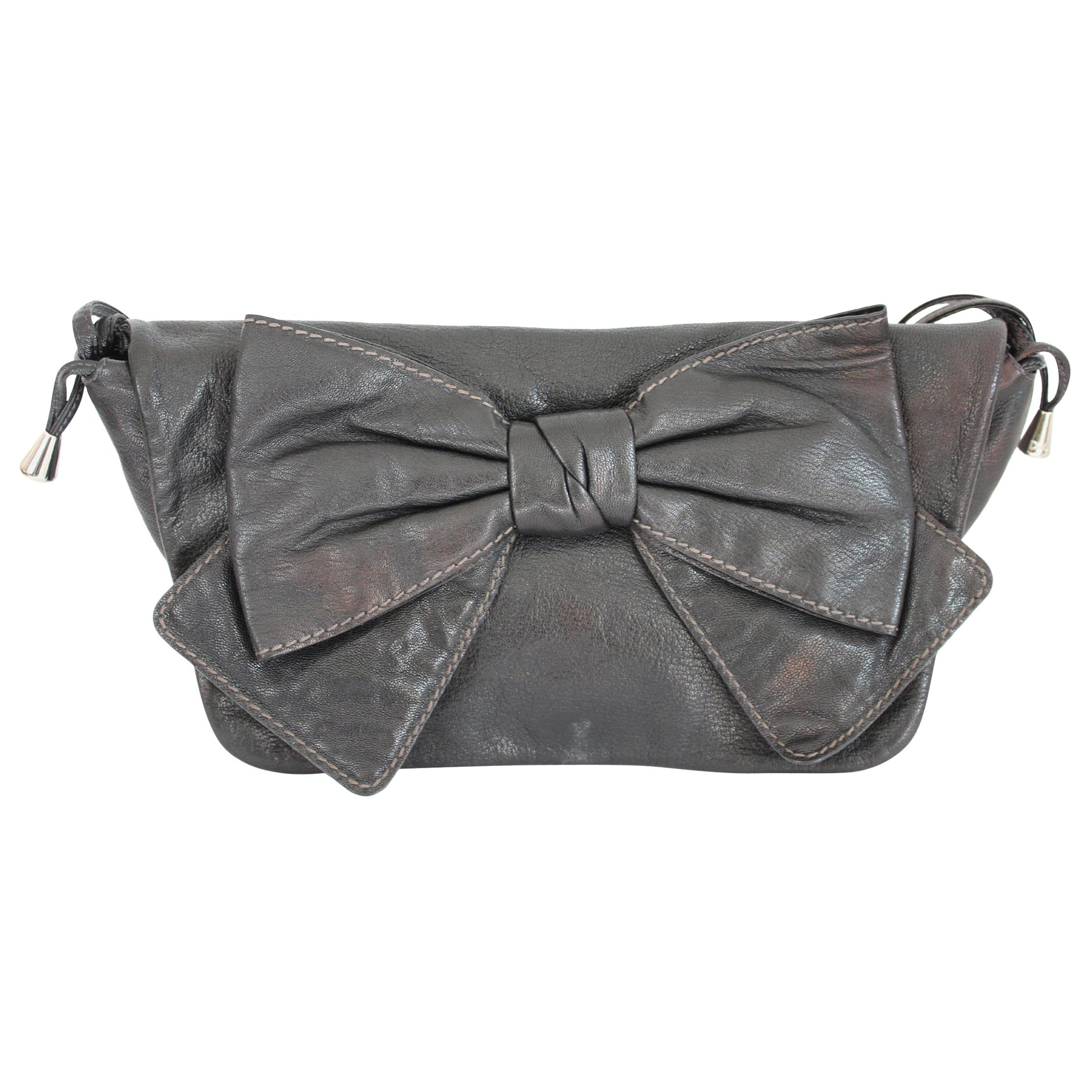 1990s Dolce & Gabbana Maika Black Leather Bow Shoulder Bag