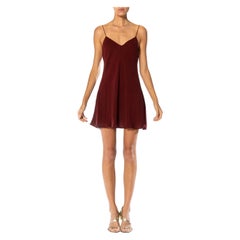 DONNA KARAN Robe-culotte en mousseline de soie rouge brique coupée en biais, années 1990