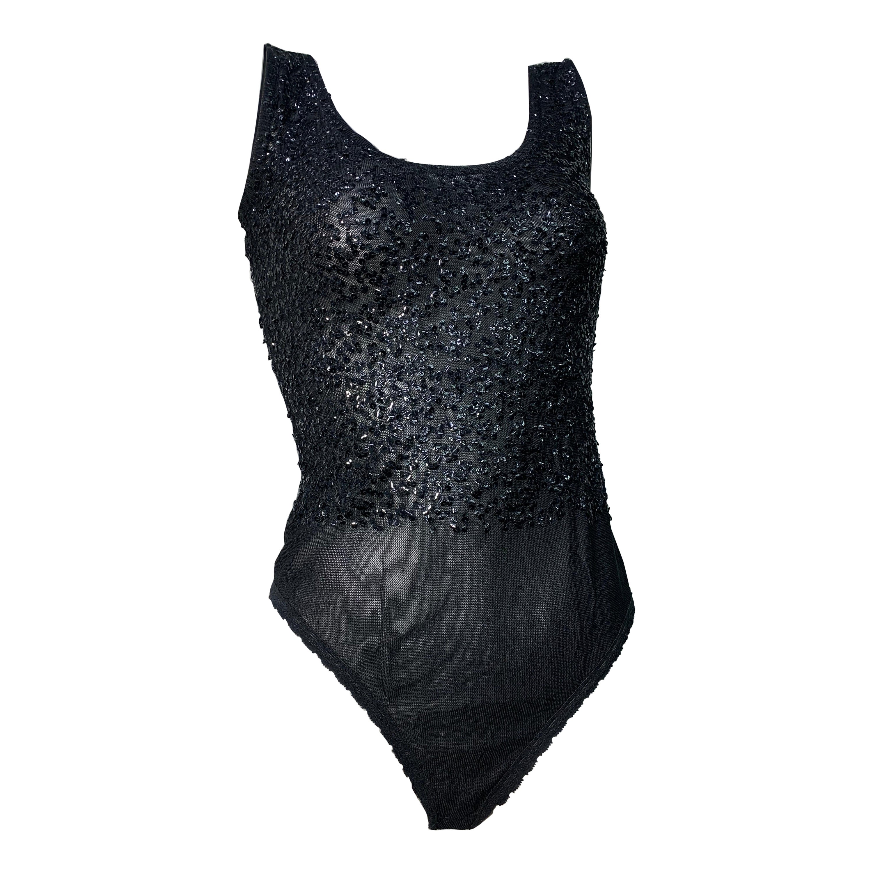 Traje de tirantes con lentejuelas de Donna Karan, años 90
