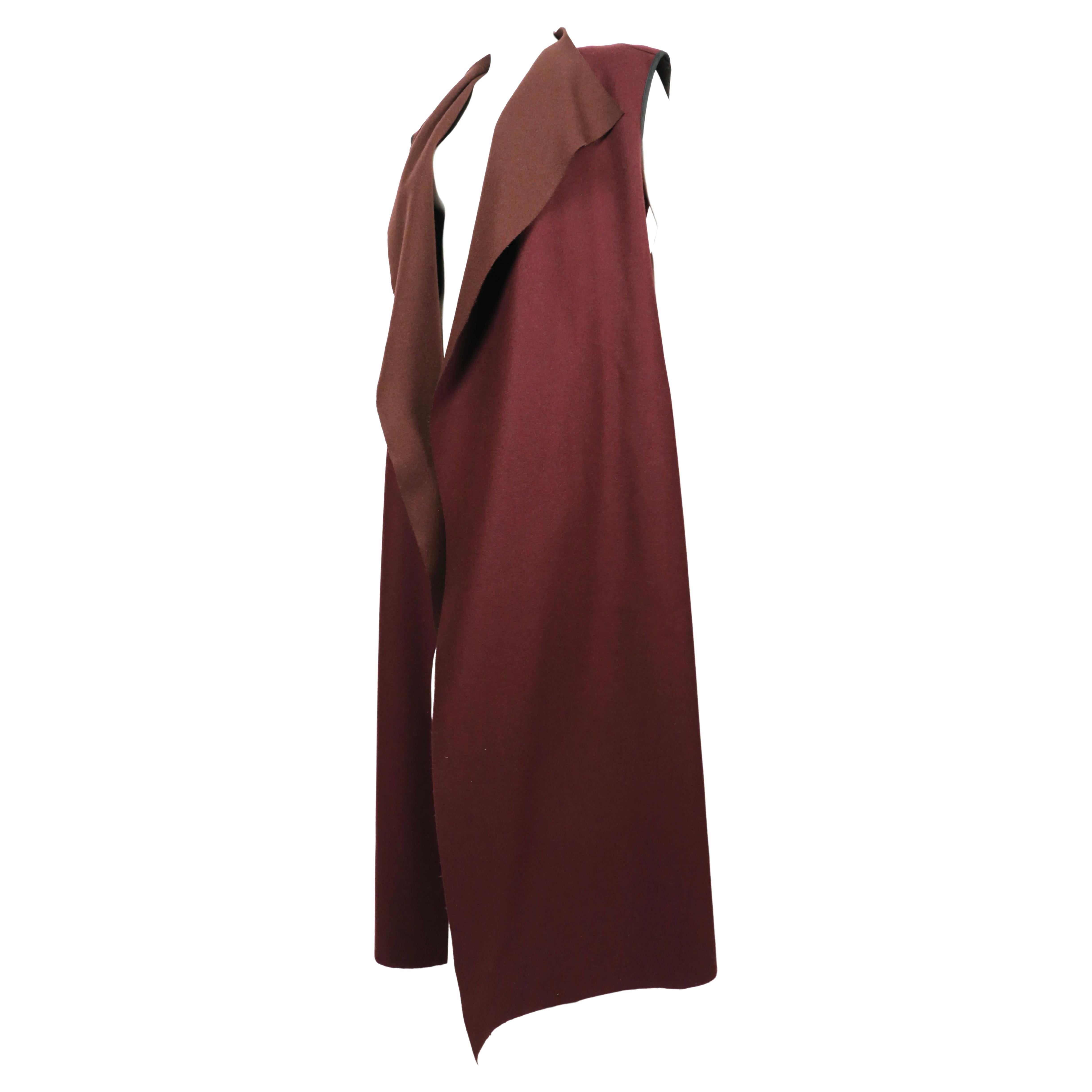 Brown 1990's DRIES VAN NOTEN maxi length burgundy wool sleeveless coat For Sale