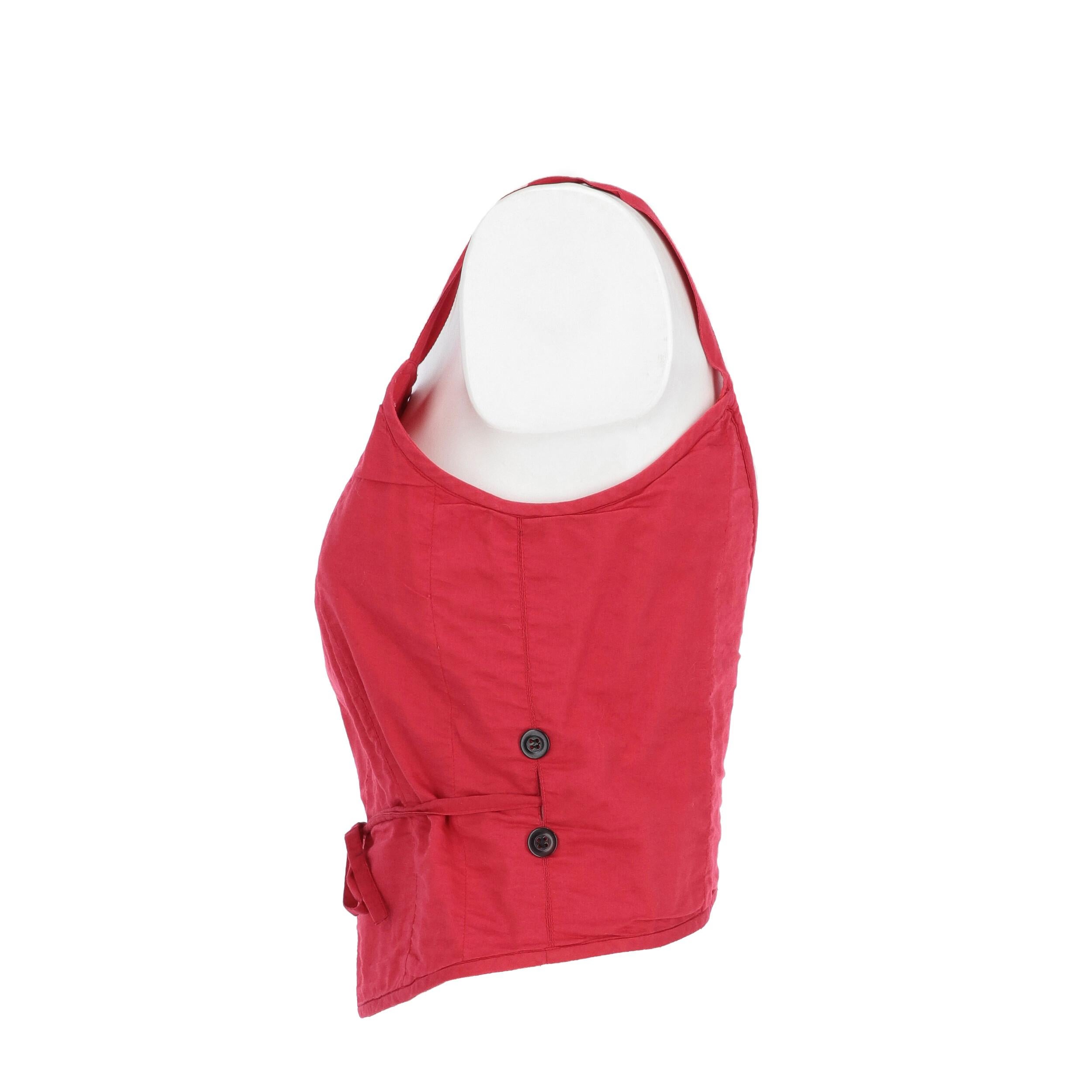 Dries Van Noten raspberry red cotton tank top with straps. Square neckline, open back, decorative front buttons and drawstring fastening.

Years: 90s
Made in Belgium
Size: 36 EU

Flat measurements
Height: 42,5 cm
Bust: 44