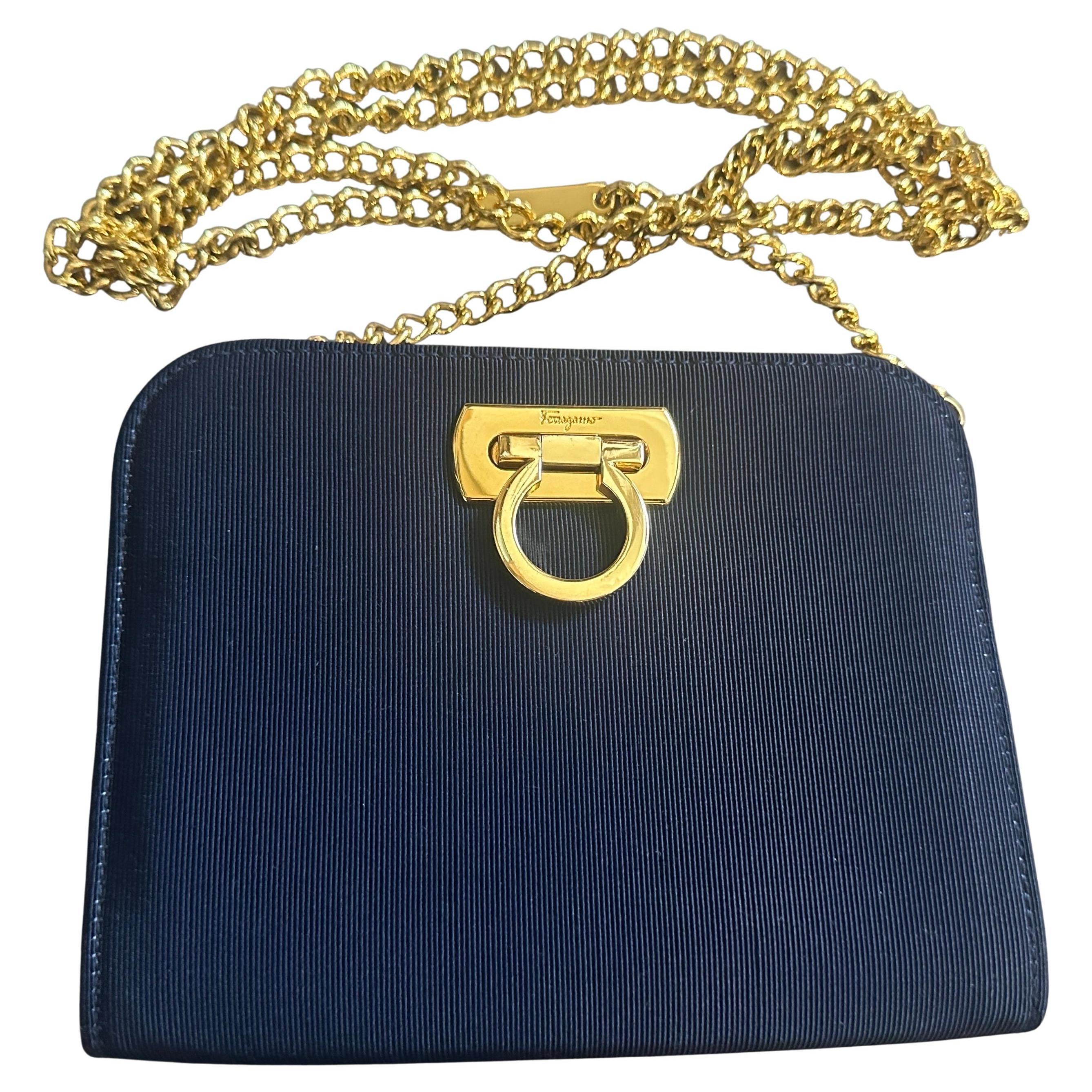 1990s elegant Blue Fabric and Brass Belt Hand Bag by Salvatore Ferragamo