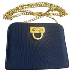 1990s elegant Blue Fabric and Brass Belt Hand Bag by Salvatore Ferragamo