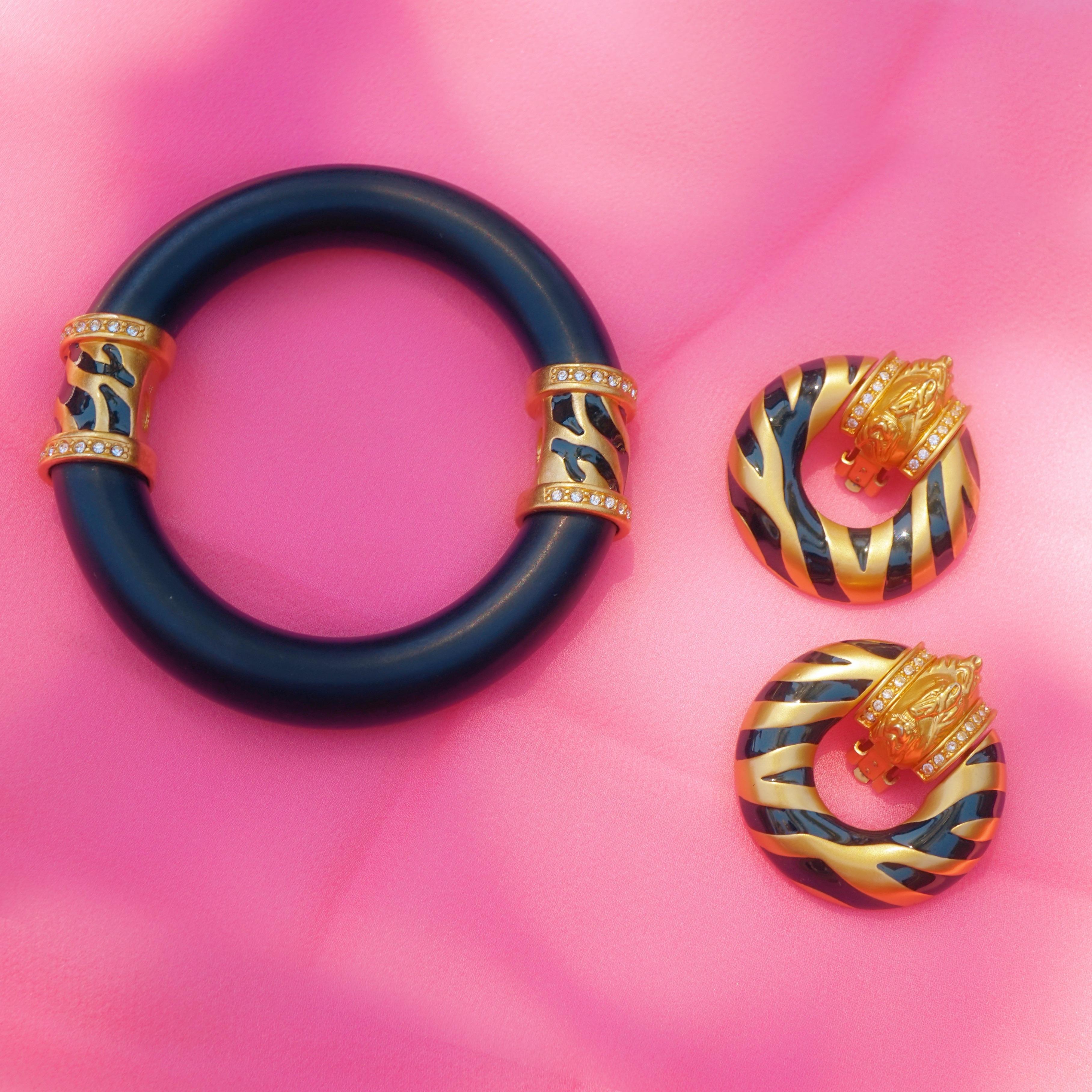 - Set of two items: bangle bracelet & door knocker earrings with Zebra motif
- Bangle measures 3.5