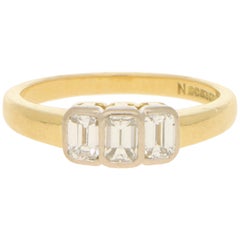 Emerald-Cut Diamond Three-Stone Engagement Ring in 18k Yellow and White Gold