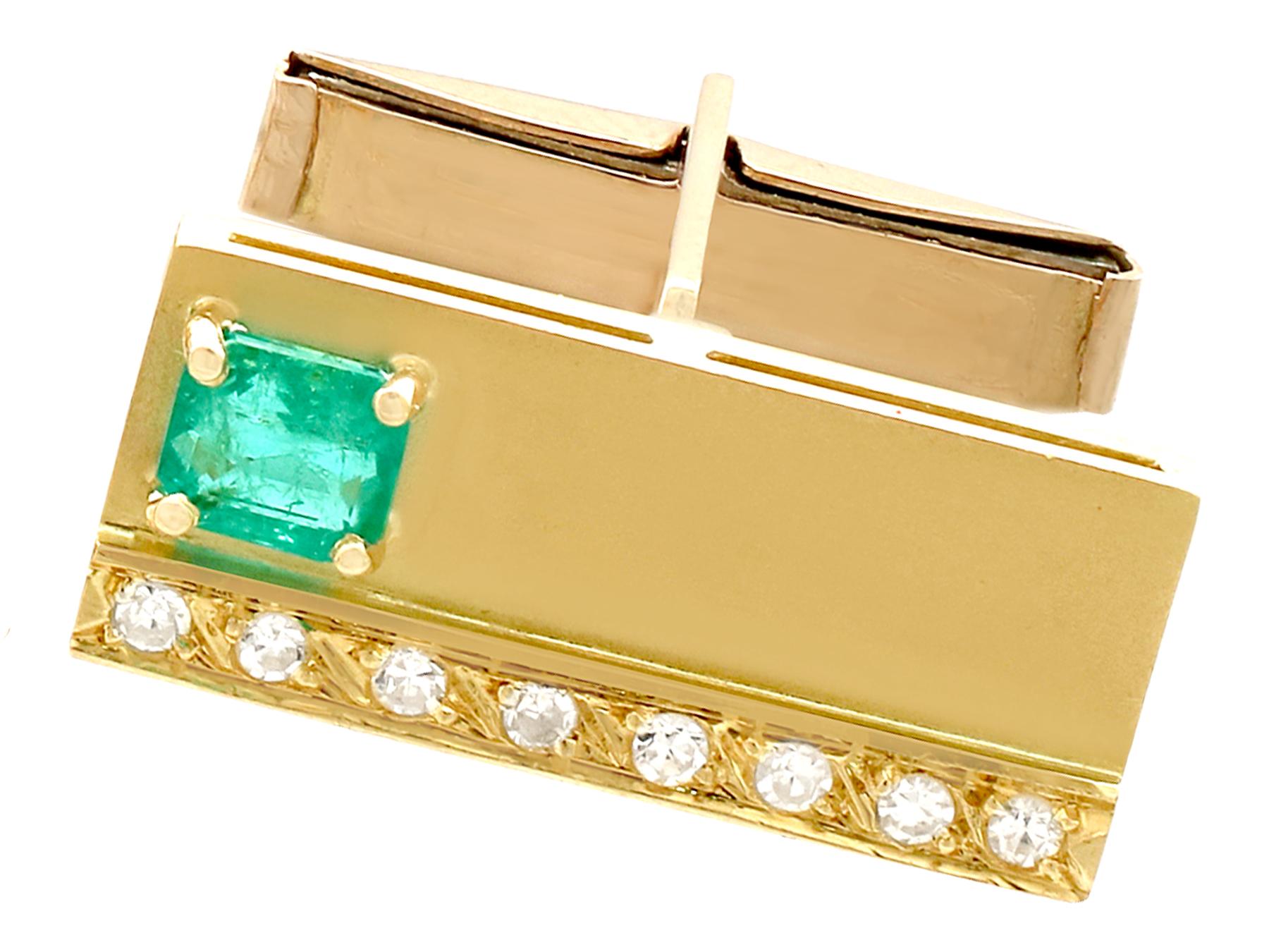 An impressive pair of vintage 0.90 carat emerald, 0.36 carat diamond and 18 karat gold cufflinks; part of our diverse diamond jewelry and estate jewelry collections.

This fine and impressive pair of emerald and diamond cufflinks has been crafted in