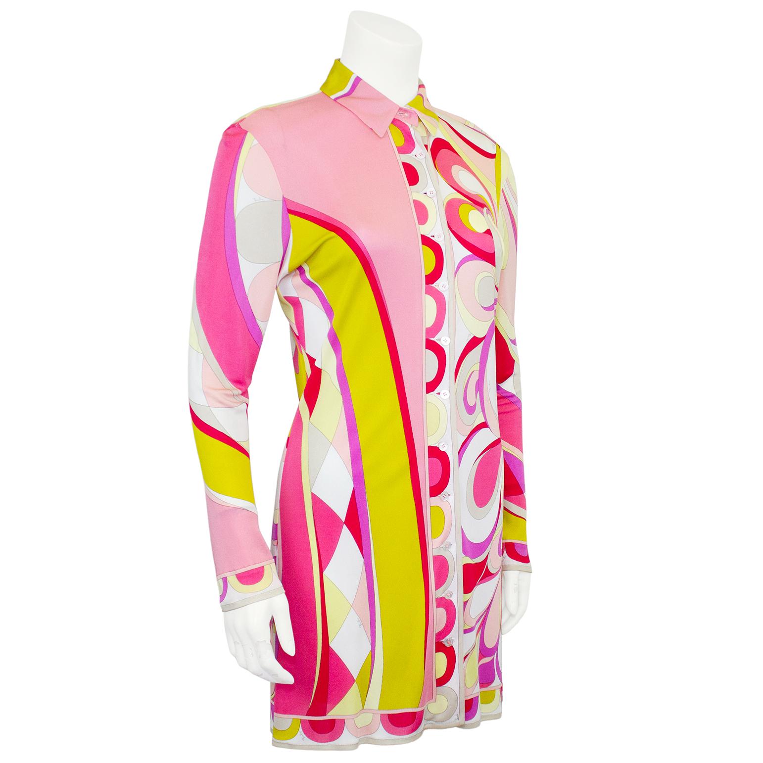 Great Emilio Pucci tunic from the 1990s. Abstract printed sheer lycra with shades of pink, red, yellow and purple. The colour combination with the 1960s inspired print is very fun, bright and happy. Can be worn with jeans or as a bathing suit cover