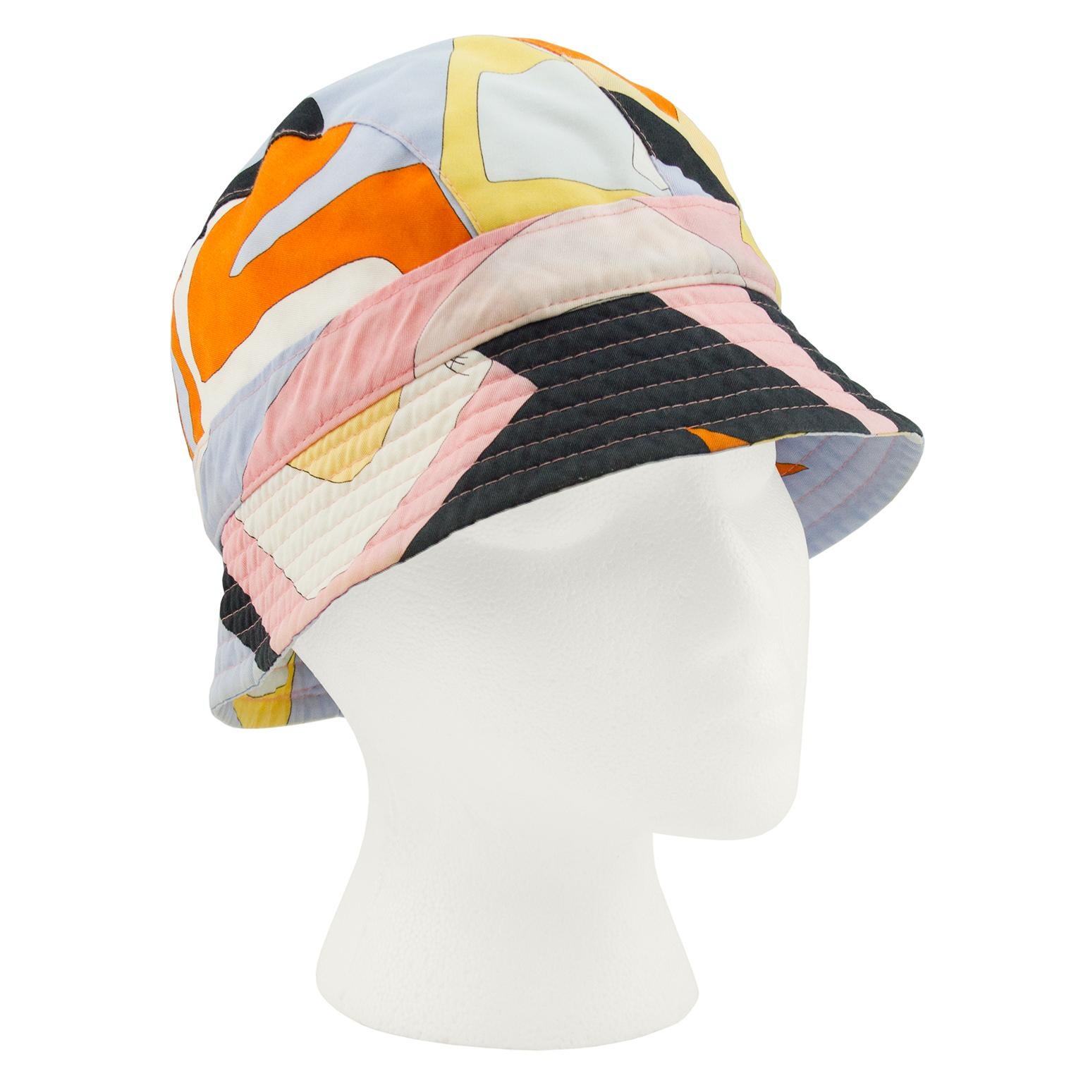 Emilio Pucci purple, pink, orange, black and yellow abstract printed cotton bucket hat from the late 1990/early 2000s. A snug fit with a clean white interior and pink stitching along the ribbed brim. Brand markings throughout fabric. In excellent