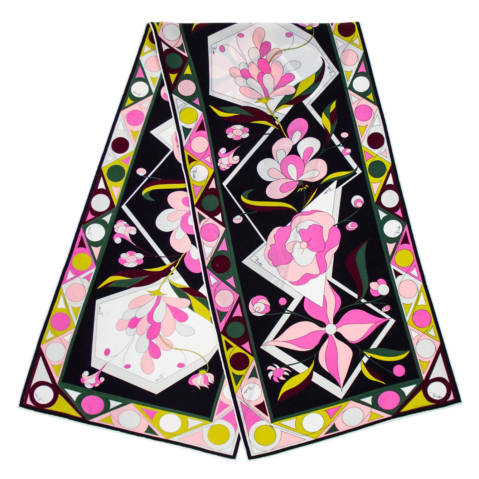 This is such a fun 1990s Emilio Pucci silk scarf! A floral take on the iconic Pucci abstract geometric print with pink flowers along the centre. This scarf features such a great colour combination, with black, white, pink, brown, dark green and