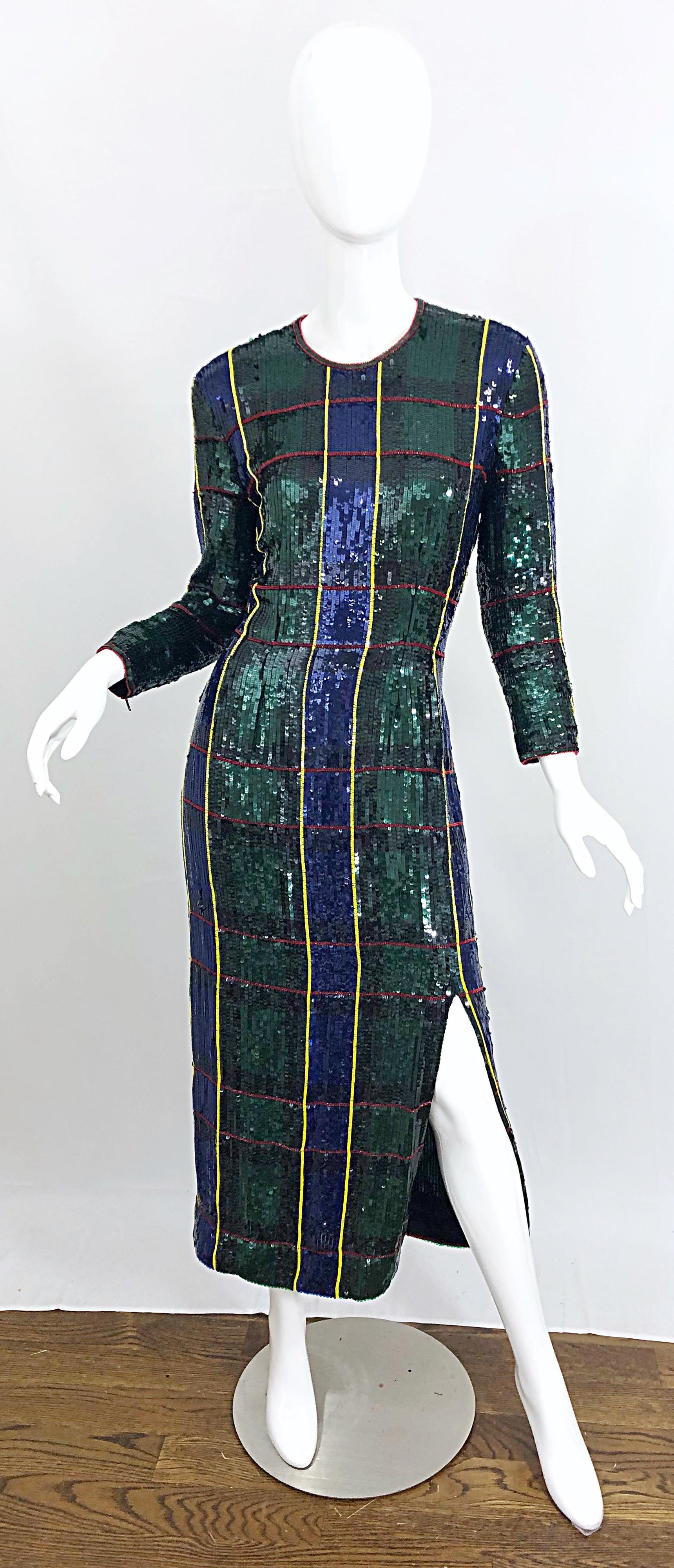 Beautiful vintage 90s ESCADA COUTURE fully sequined tartan plaid silk evening gown! Features a vibrant hunter green, navy blue, yellow and red plaid pattern throughout the entire dress. Thousands of hand-sewn sequins. Tailored long sleeves have