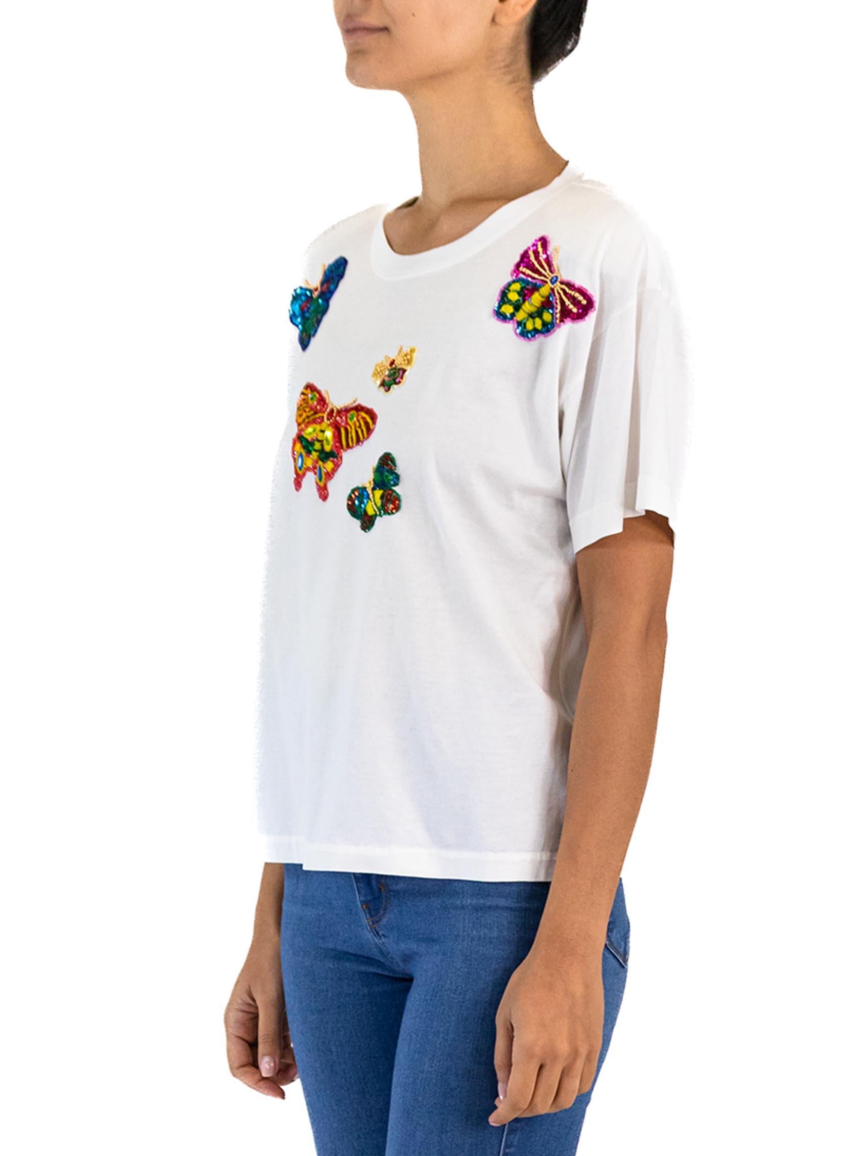 1990S ESCADA T-shirt en jersey de coton blanc à paillettes papillon
