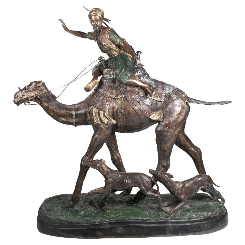 Sculpture européenne en bronze des années 1990 représentant un chasseur arabe chevauchant un camel