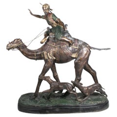 1990s European Painted Bronze Sculpture of Arab Hunter Riding a Camel