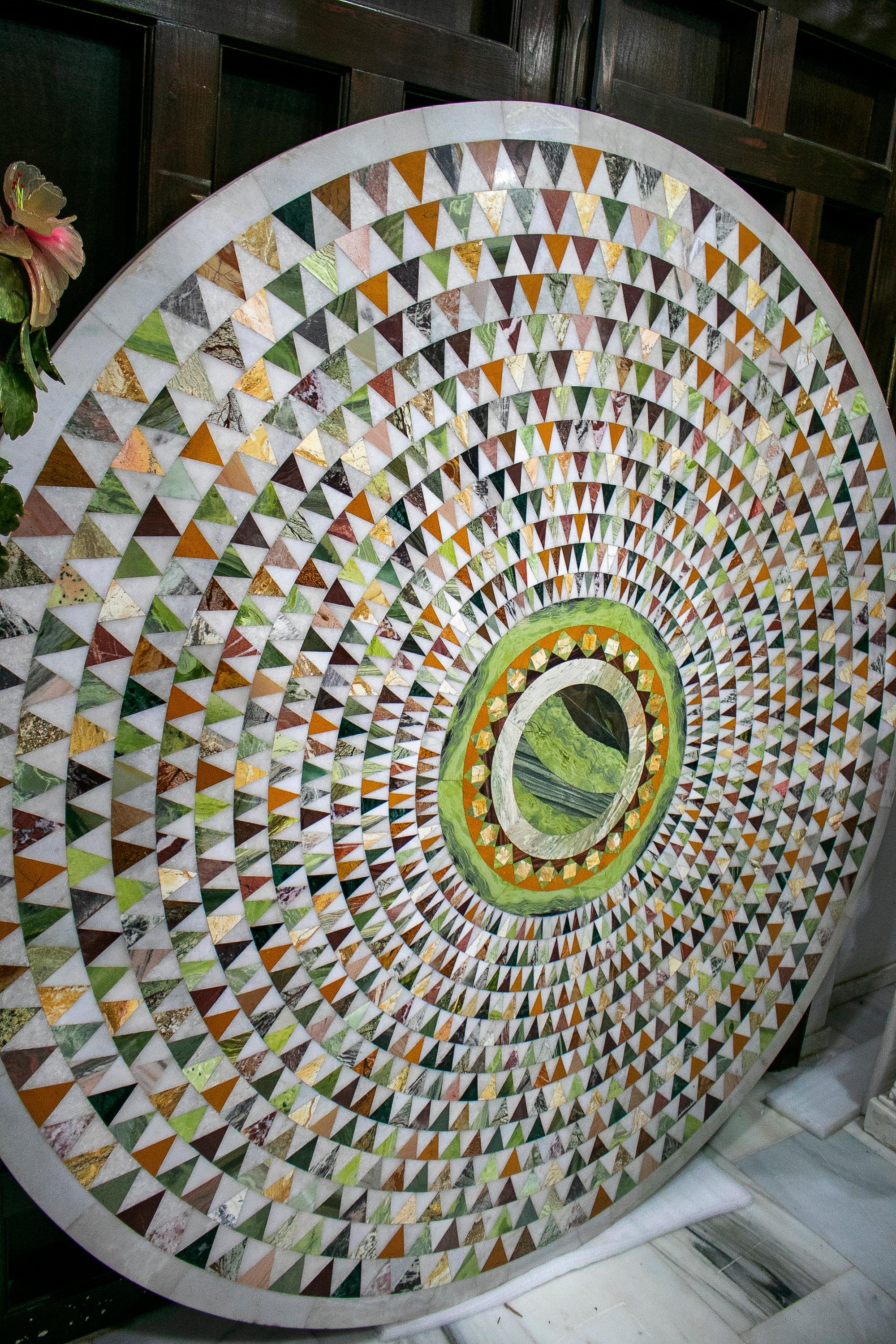 1990s European round mosaic hard stones geometric round table top.