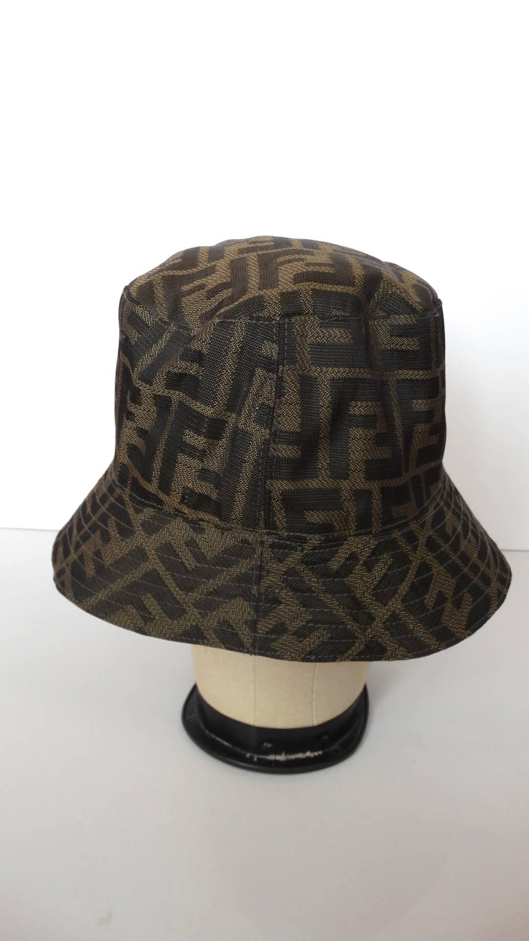 Fendi's signature Zucca print is all the rage right now! Snag yourself a piece of 1990s Fendi with our amazing monogram bucket hat! Classic contrasting brown 