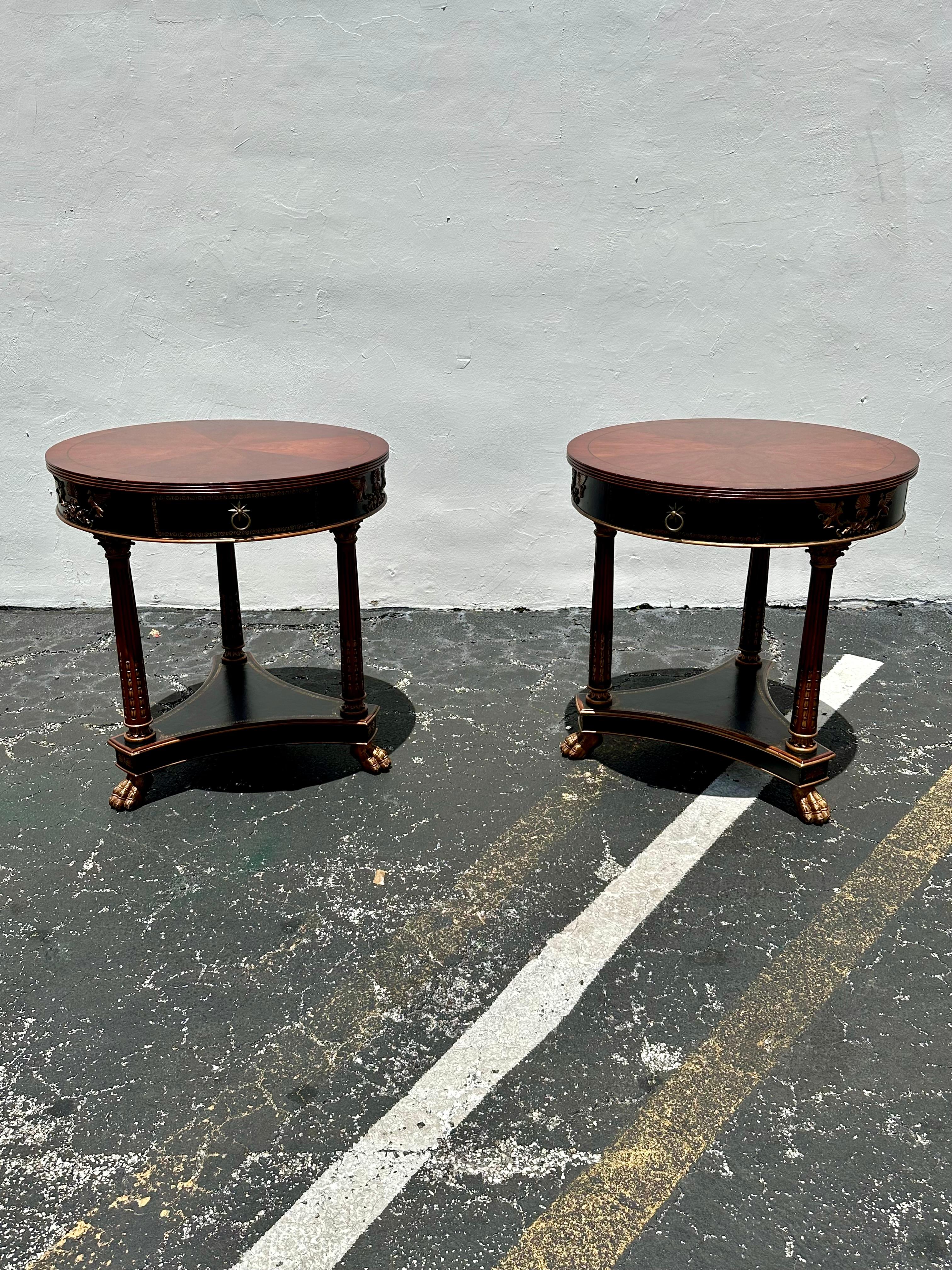 Indulge in the timeless elegance of this exquisite single drawer, double tier end tables, dating back to the 1990s. Crafted with meticulous attention to detail, the set showcases a stunning hand crafted leather wrapped over wood finish, ensuring a