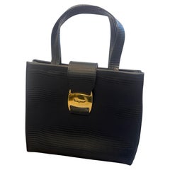 1990s Ferragamo Black Leather and Brass Hardware Top Handle Bag