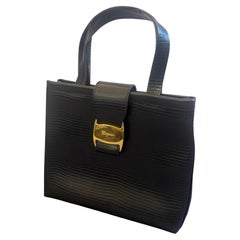 1990s Ferragamo Black Leather and Brass Hardware Top Handle Bag