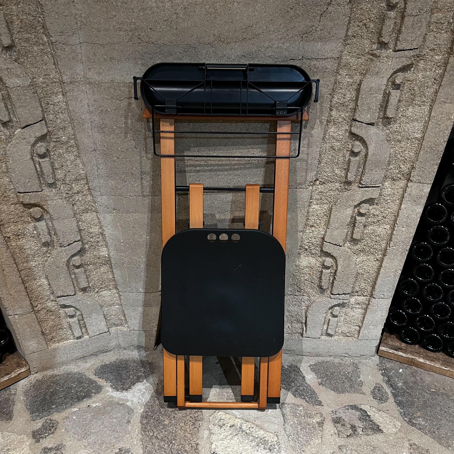 1990s Italy Foppapedretti Gentleman's folding valet with chair.
In the Style of Ico and Luisa Parisi
Chair can be folded into a very practical rectangular shape, which takes up hardly any space.
Very good vintage unrestored condition.
Label