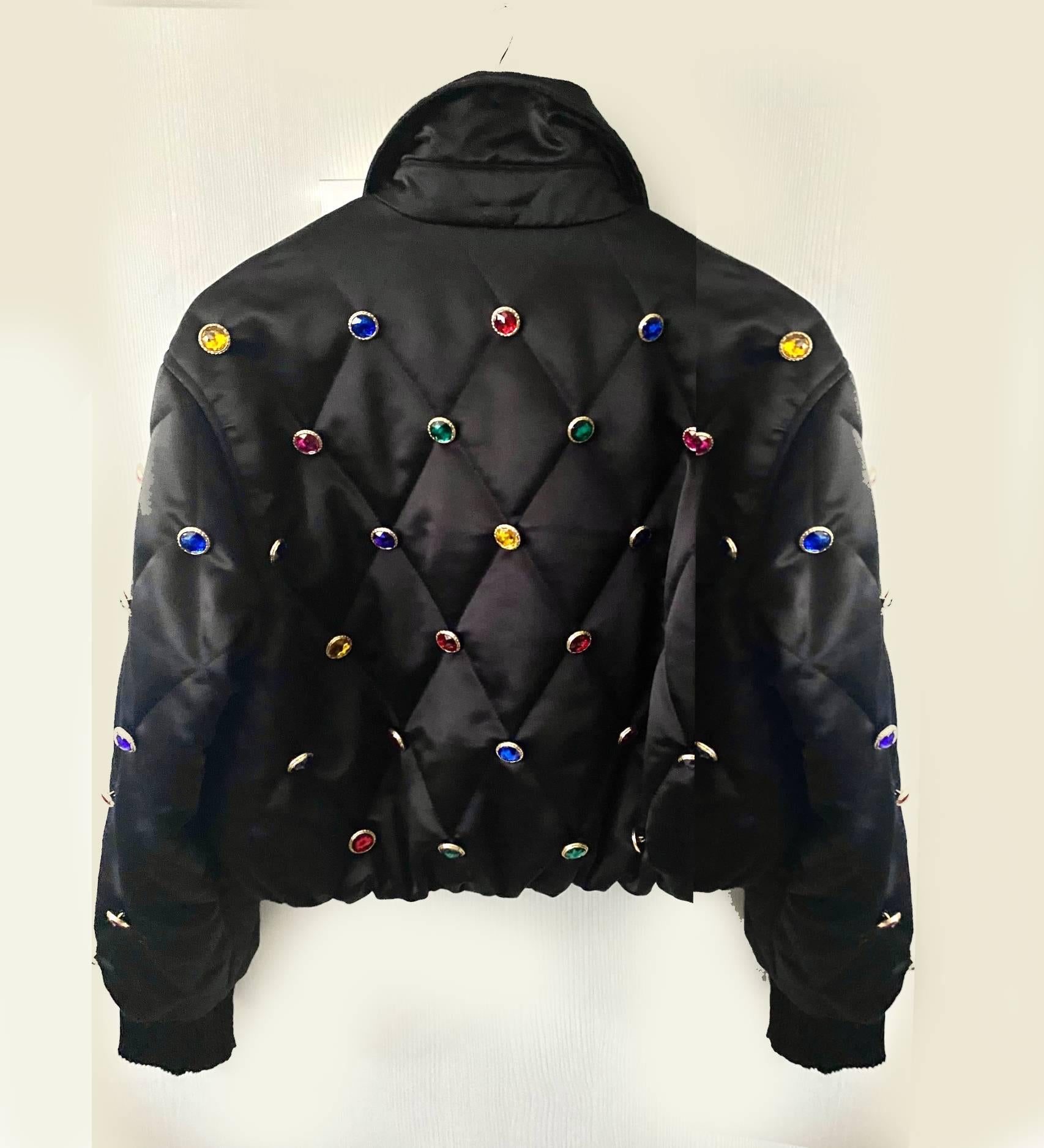 Escada Sport black colored gems gold tone metal buttons bomber crop jacket, frontal button closure, 2 pockets.  satin lining 

Condition: 1990s, excellent like new

Size: 42 IT - 10 UK - 2-4 USA

Measurements
Pit To Pit: 19