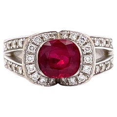 Retro 1990s French 1.20 Carat Oval Ruby and Diamond Ring in Platinum