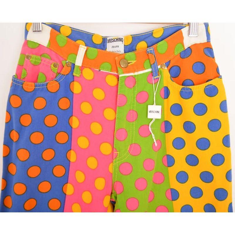 Fabulous 1990's Vintage Moschino Polka Dot patterned high waisted jeans in a vibrant pop arty, colourful print. 

Features:
Zip fasten
Classic x4 pocket design
High waisted fit
Original Moschino swing tag

MADE IN ITALY

100% Cotton

Sizing: Waist: