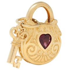 1990's Garnet 14 Karat Yellow Gold Vintage Lock & Key Pendant Charm