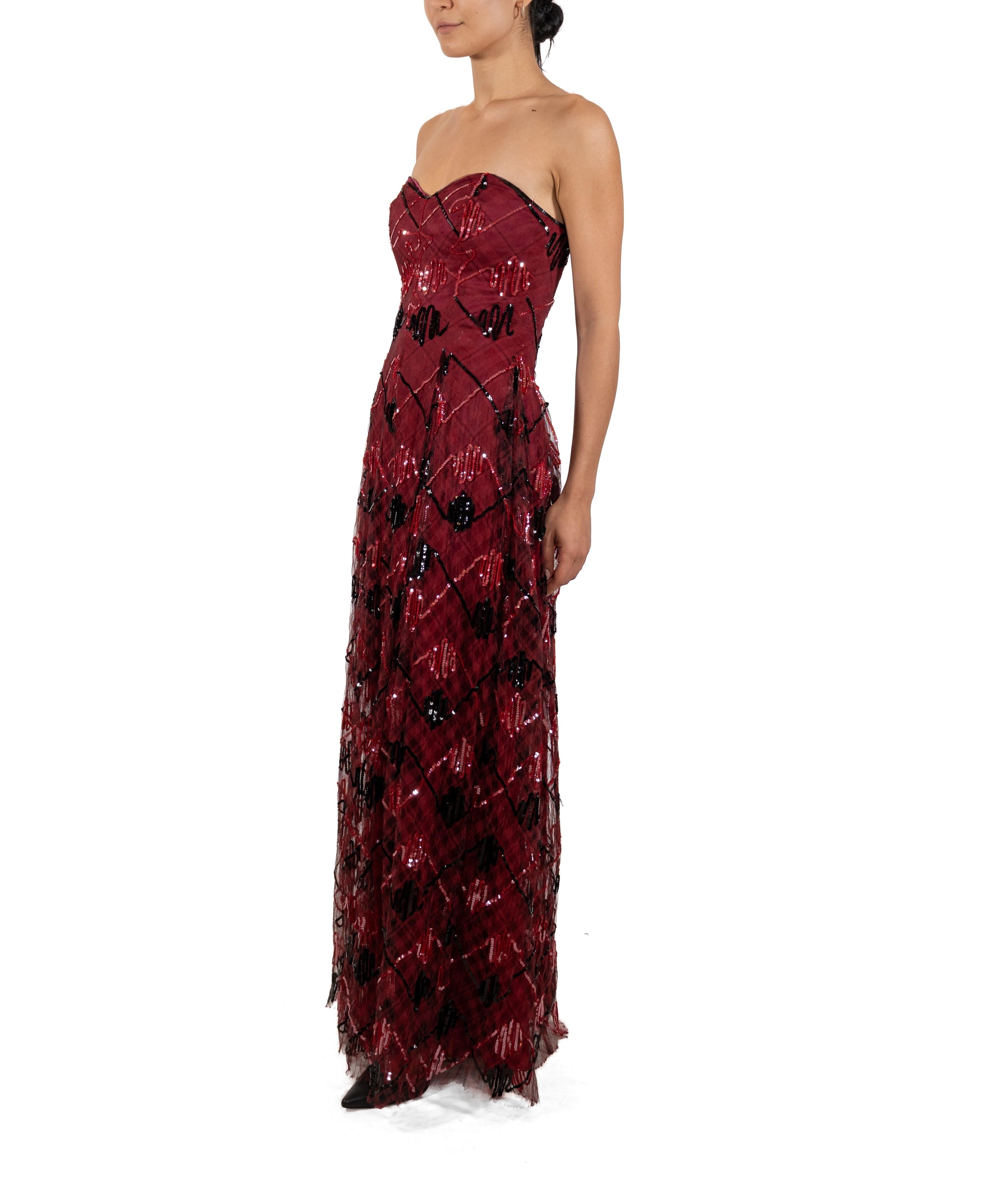 This gown retains no label, however the amount of hand-finishing points to Haute Couture or custom made quality, fully lined in silk. 1990S Garnet Red Sequined Silk Organza Plaid Gown 