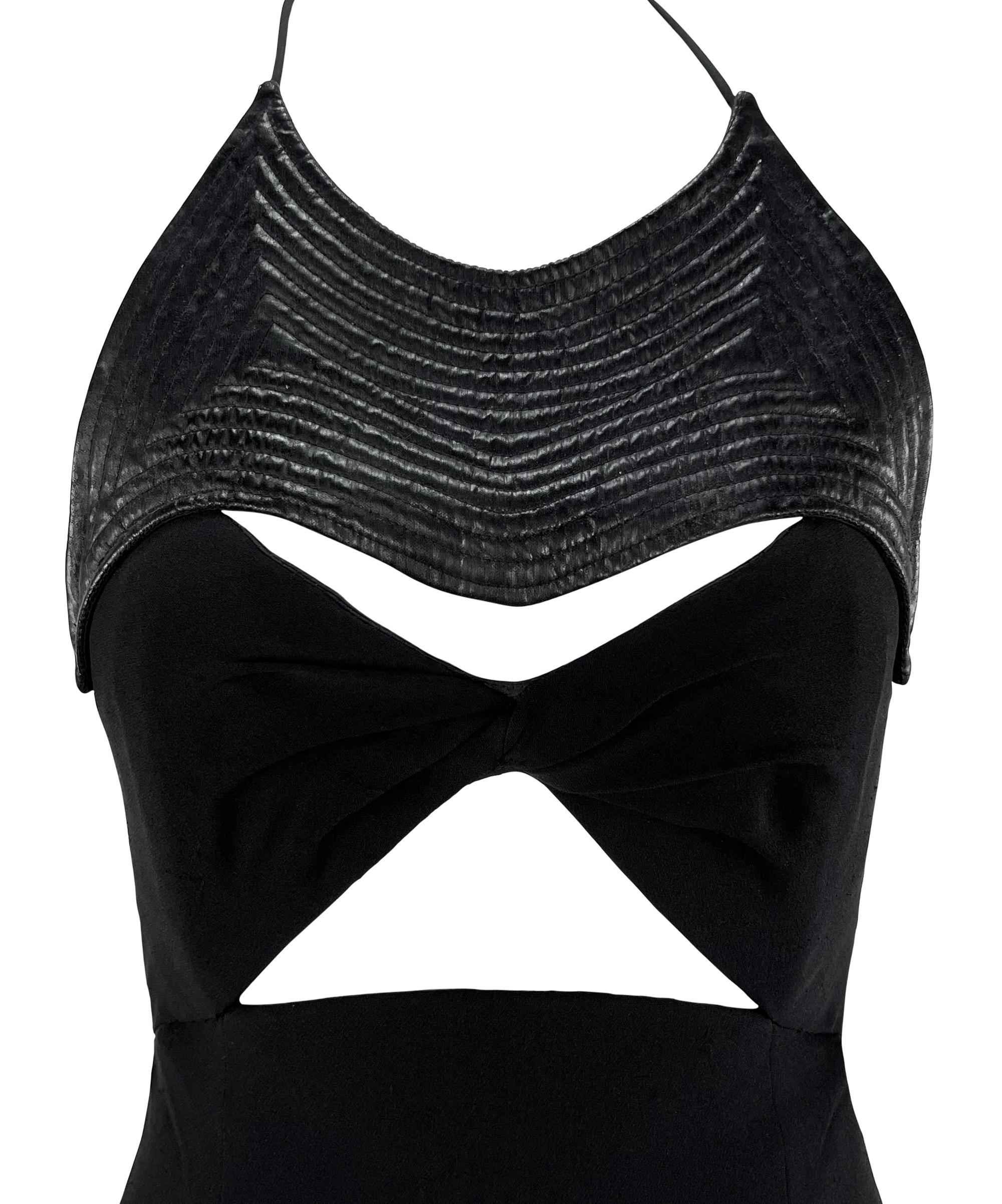 This Geoffrey Beene little black dress from the 1990s is a chic addition to any wardrobe. This mini dress features a halterneck style with thin neck straps, cutouts at the bust, and a semi-exposed back. This sexy little dress is elevated with a