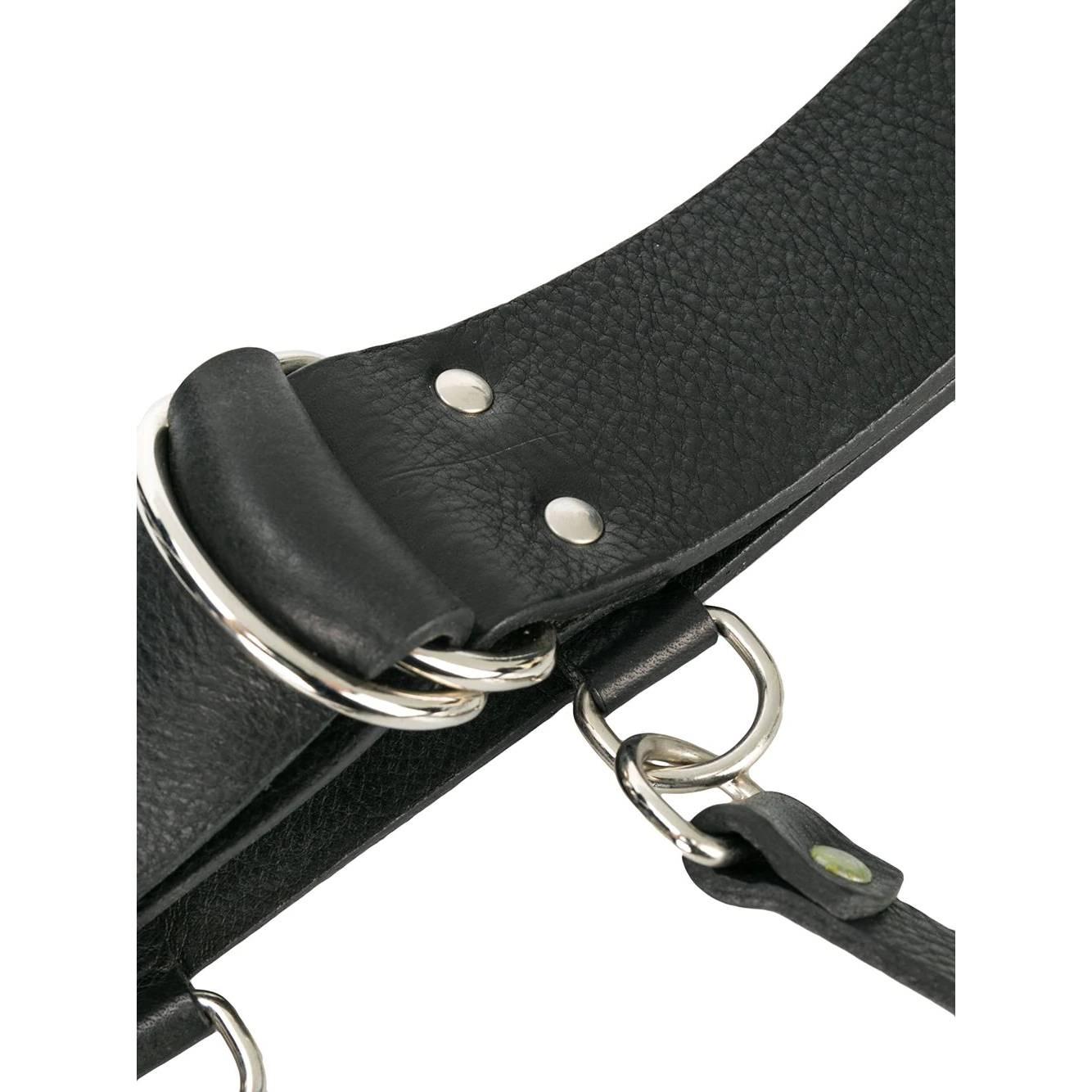 Gianfranco Ferré black leather belt with braces, closure at the waist with double ring buckle. Silver metal details.

The product has slightly oxidized metal parts as shown in the pictures.


Years: 90s

Belt

Lenght: 90 cm