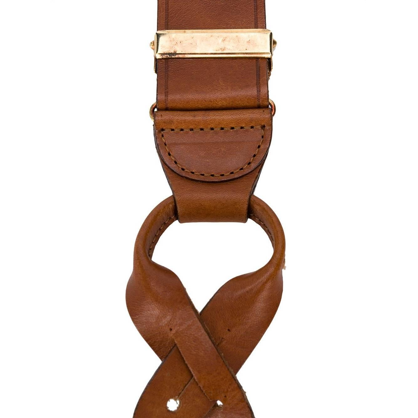 Gianfranco Ferré brown calfskin braces. Golden metal details.

The product has oxidized metal parts as shown in the pictures.

Years: 90s

One Size
