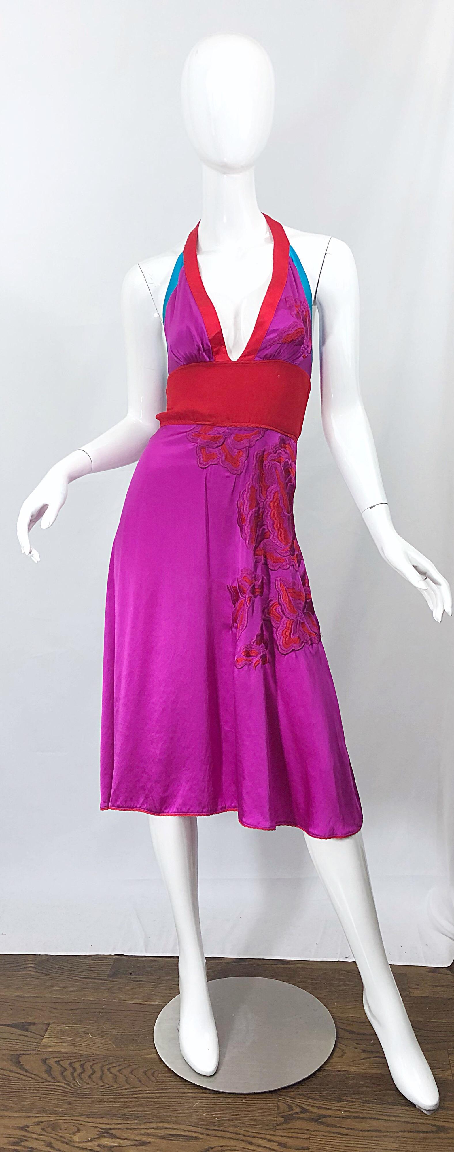 Sexy late 90s vintage GIANFRANCO FERRE plunging embrodiered silk halter dress! Features a hot pink fuchsia base with accents of red and turquoise blue throughout. Ties in the back that reveals just the right amount of skin. Hidden zipper up the back