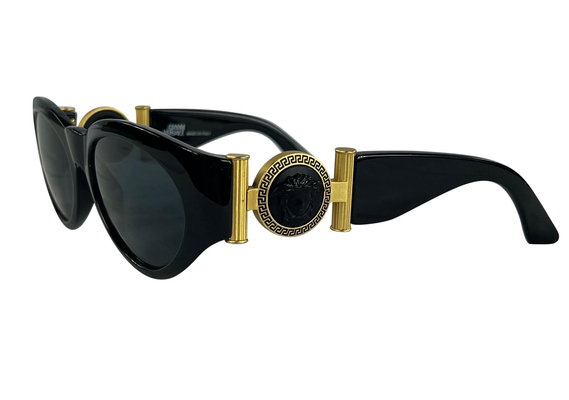Women's 1990s Gianni Versace Black Gold Medusa Medallion Oval Sunglasses For Sale