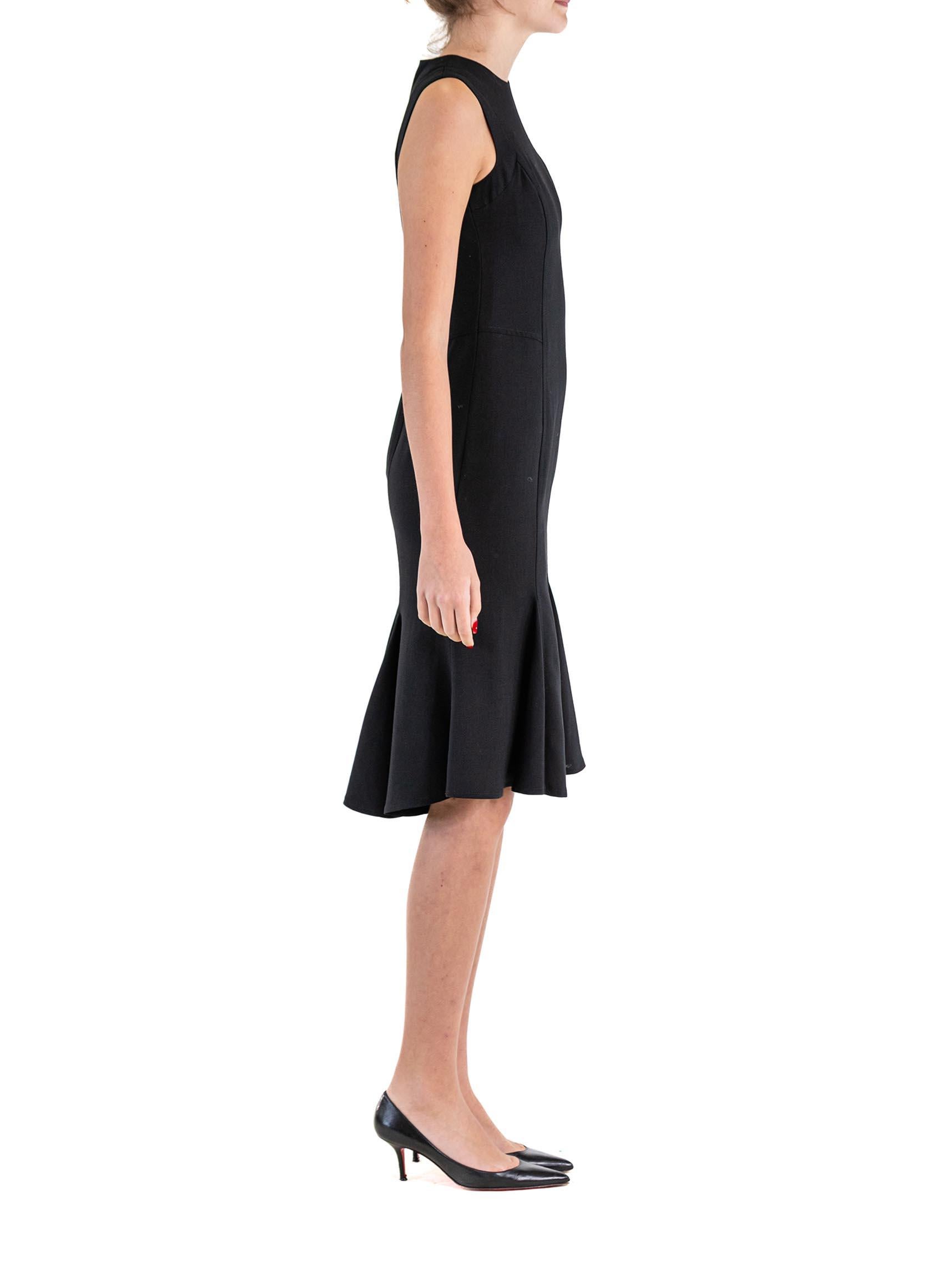 1990S GIANNI VERSACE Black Wool Crepe Dress With Fluted Hem In Excellent Condition For Sale In New York, NY