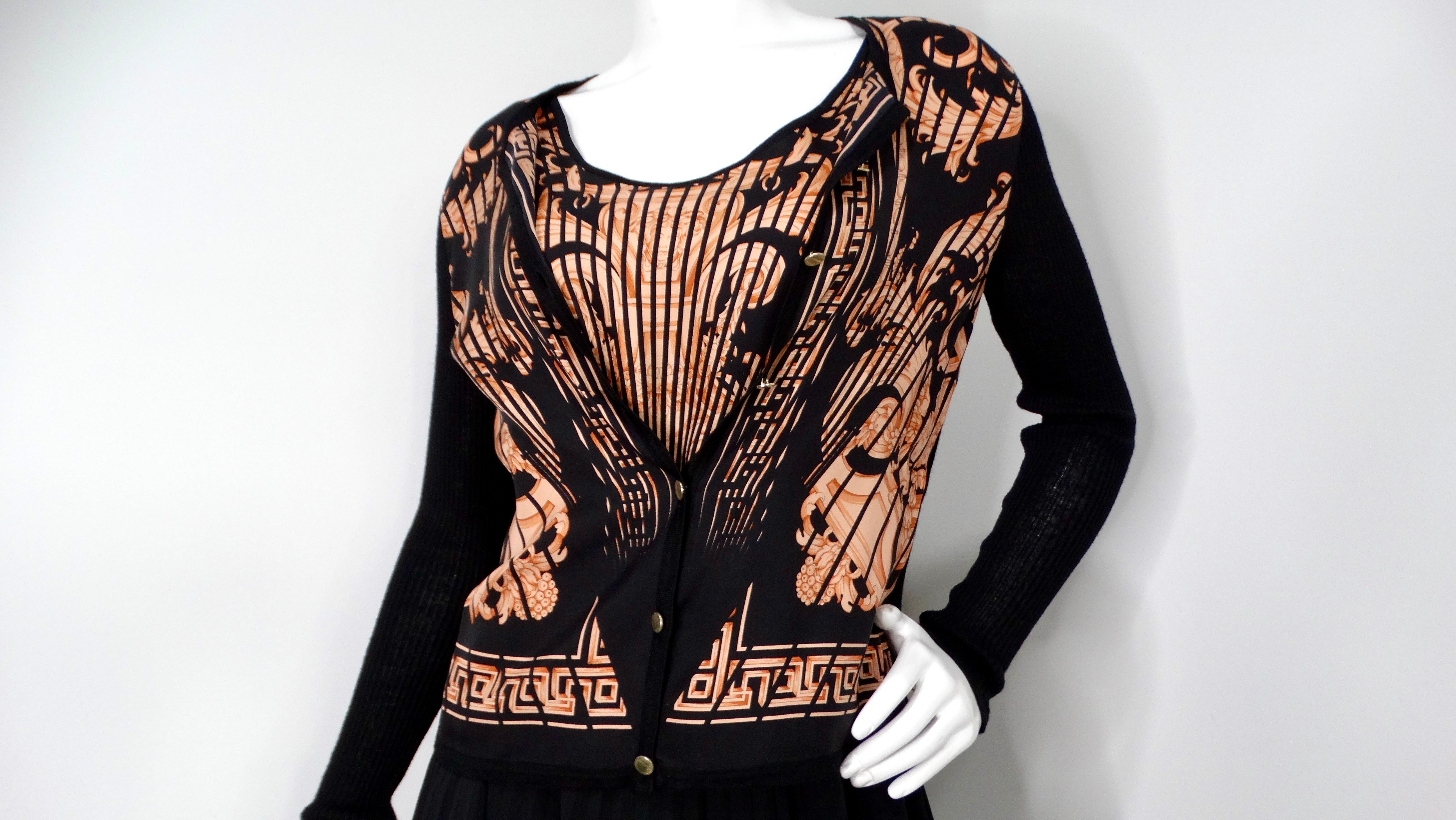 This stunning 1990s Gianni Versace Couture three-piece set showcases the designer's iconic craftsmanship and vibrant style. The ensemble features a pleated black skirt that offers a classic silhouette, perfectly balanced by an eye-catching