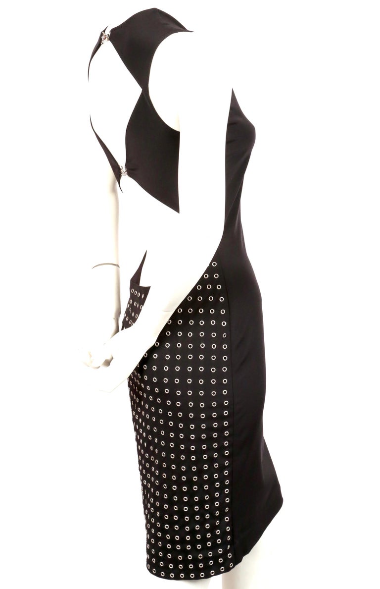 1990's GIANNI VERSACE COUTURE black jersey dress with grommets and cut out back For Sale at 1stDibs