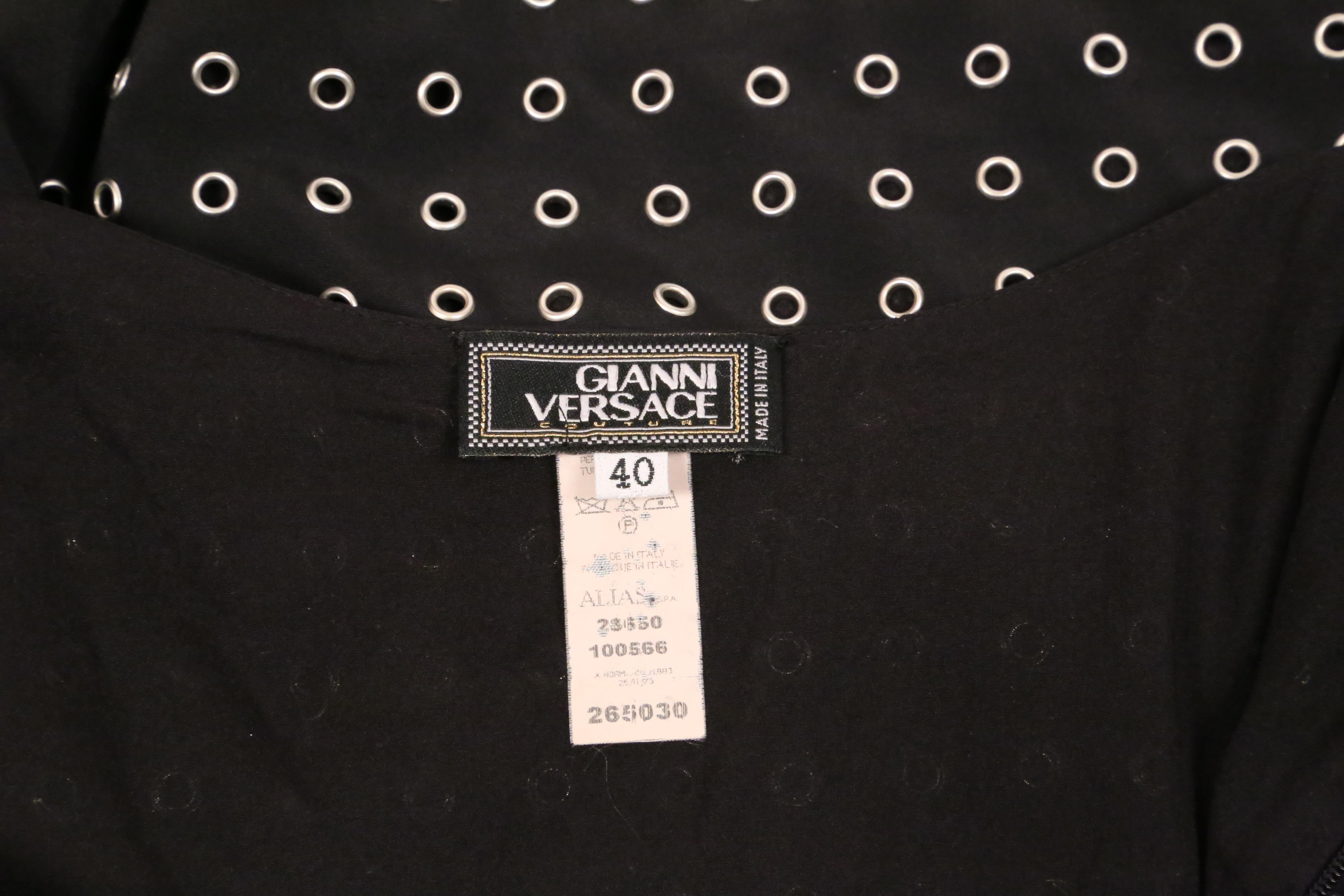 1990's GIANNI VERSACE COUTURE black jersey dress with grommets and cut out back For Sale 3