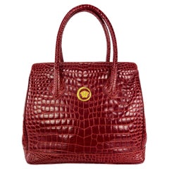 Gianni Versace Couture anni '90: borsa grande Medusa in pelle rossa goffrata
